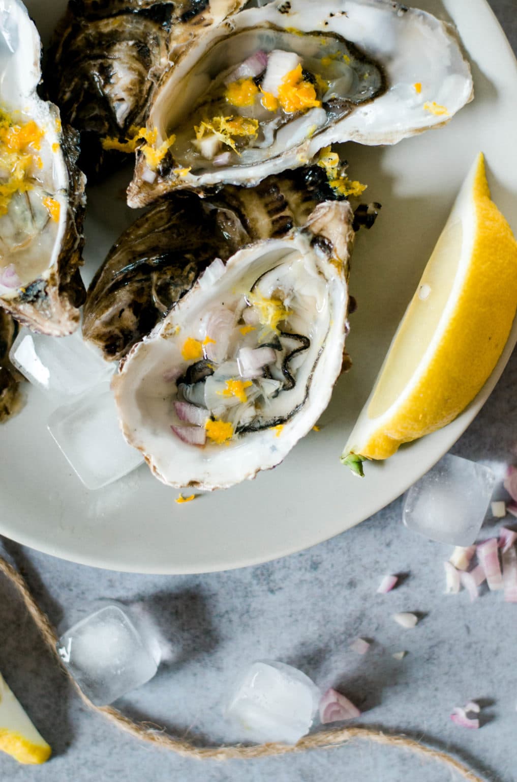 Huîtres au vinaigre de miel, échalote et agrumes Recette