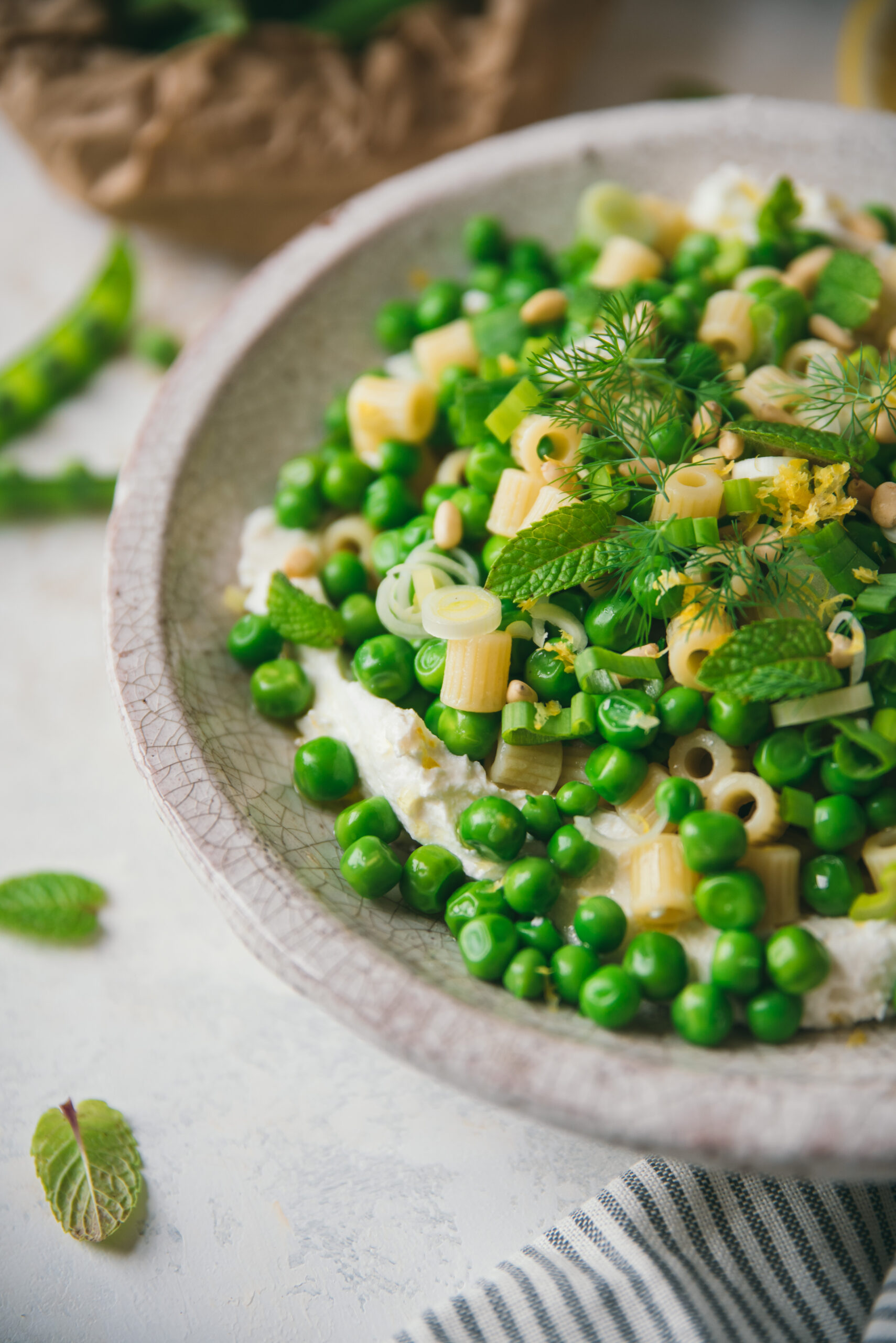 Pasta with whipped Ricotta and green peas