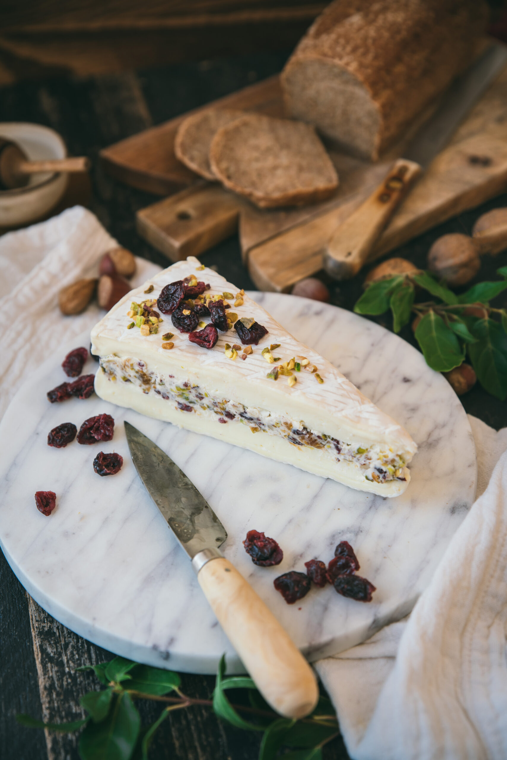 Brie Cheese Stuffed with Cranberries and Nuts