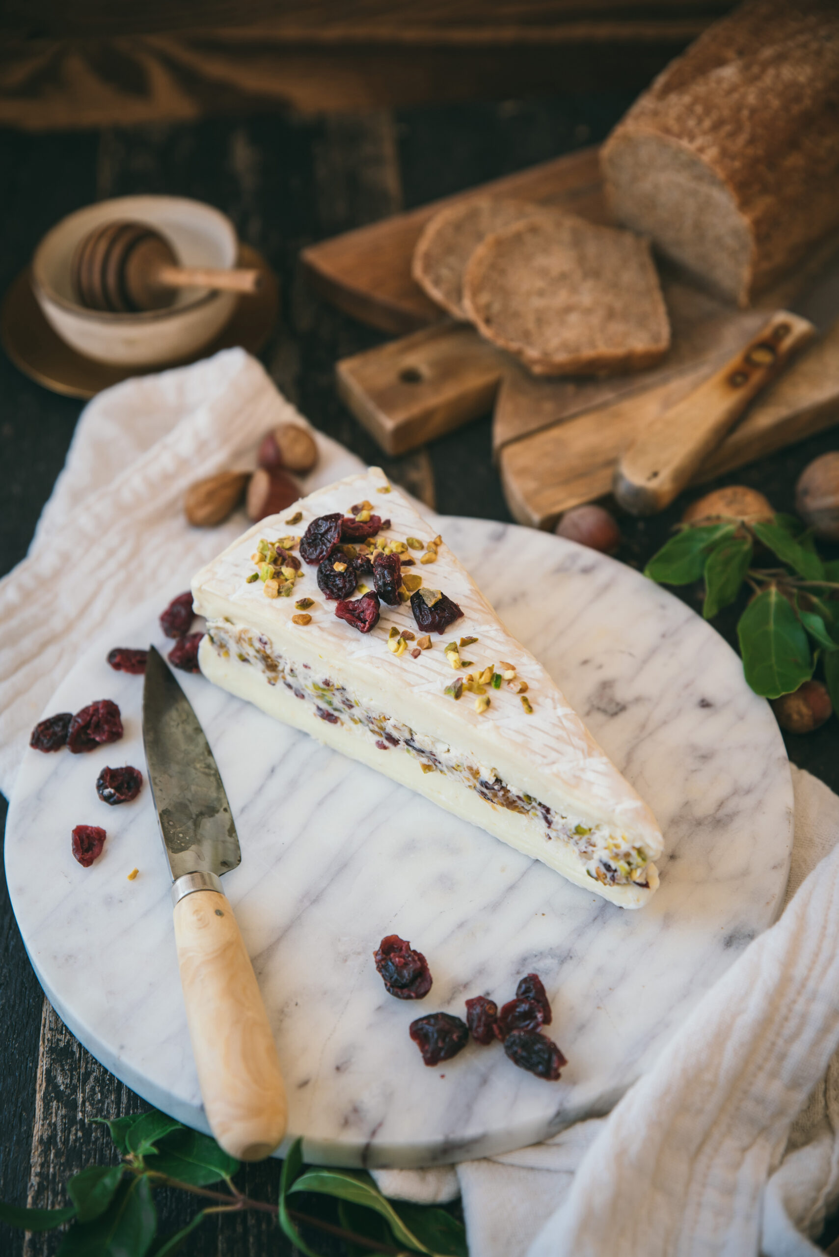 Brie Cheese Stuffed with Cranberries and Nuts