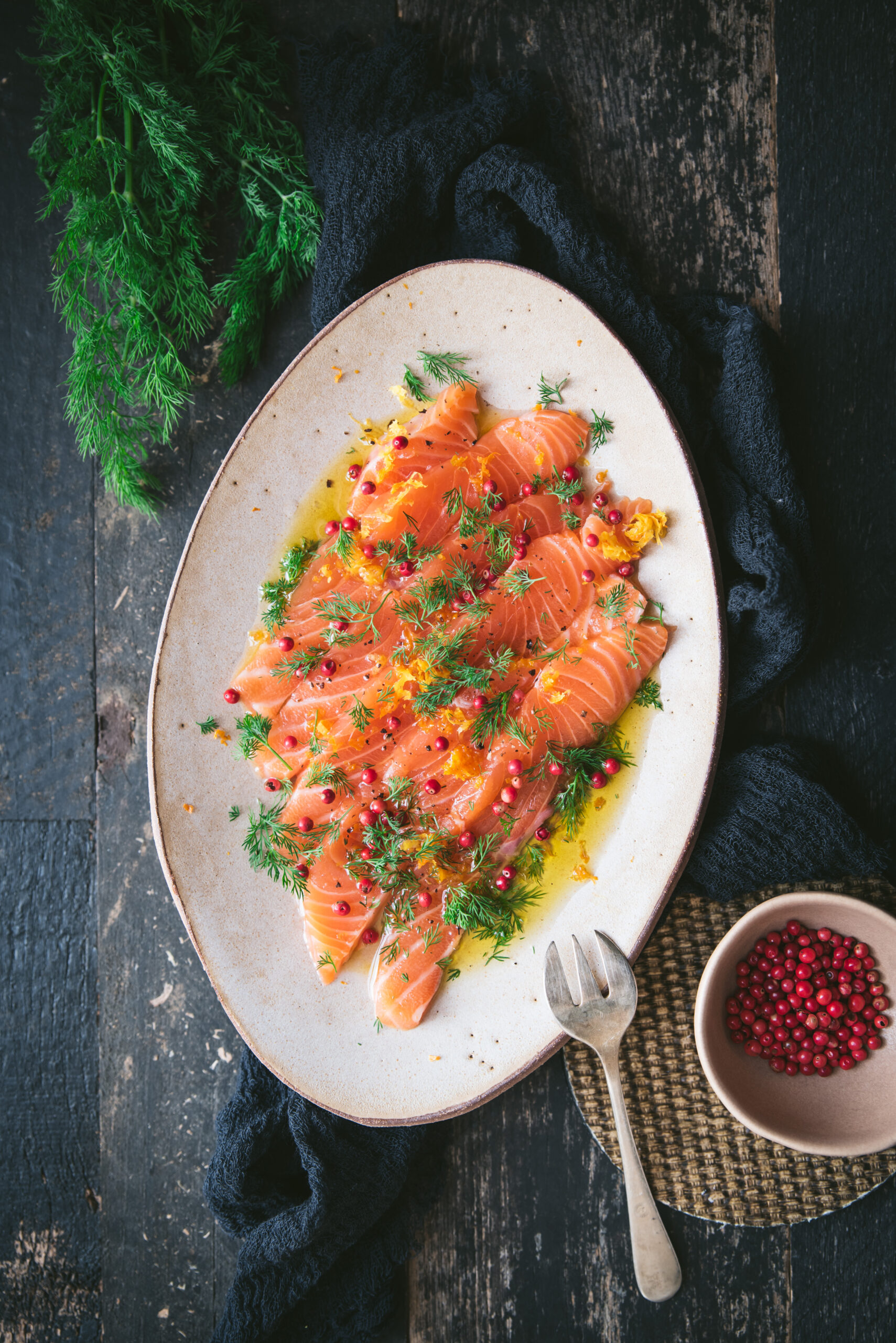 raw salmon carpaccio marinated with olive oil and dill